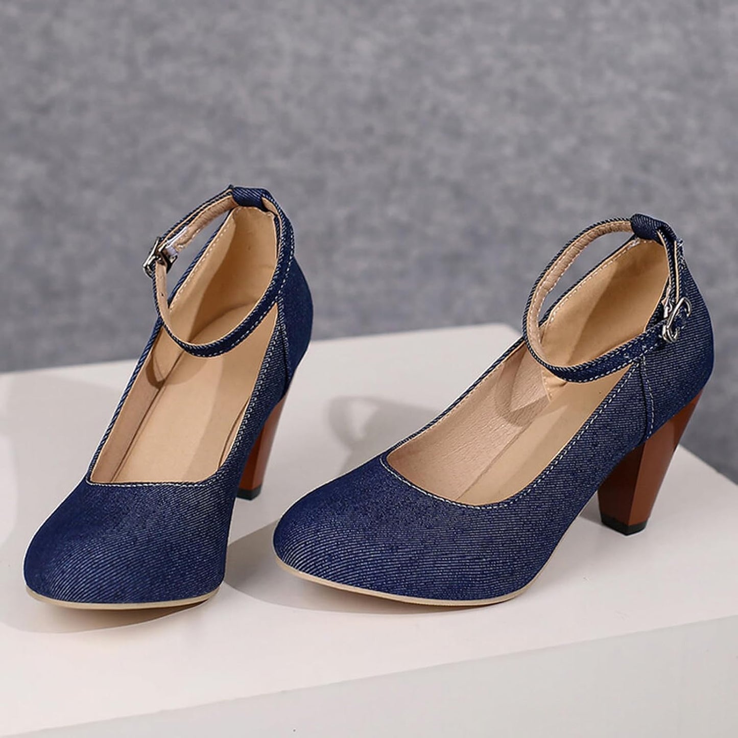 High-heeled short boot-style lace-up denim women's shoes, with a round toe design, thick heel, high comfort level, 3-inch shoe length, suitable for parties, events, offices or work settings. Decorated with a bow.